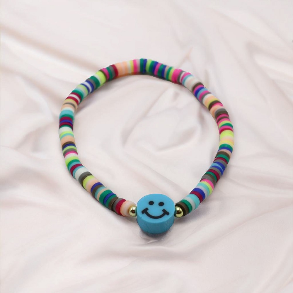 B-106-01-1.jpg Multi-Shade Blue Bracelet with Blue Smiley Charm